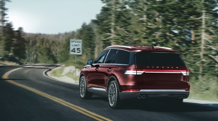 A 2024 Lincoln Aviator® SUV is being driven on a winding mountain road | Courtesy Lincoln in Altoona PA