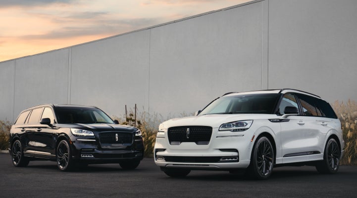 Two Lincoln Aviator® SUVs are shown with the available Jet Appearance Package | Courtesy Lincoln in Altoona PA